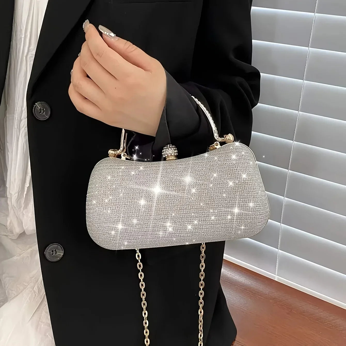 Sparkling rhinestone evening bag with chain strap, perfect for glamorous night outings