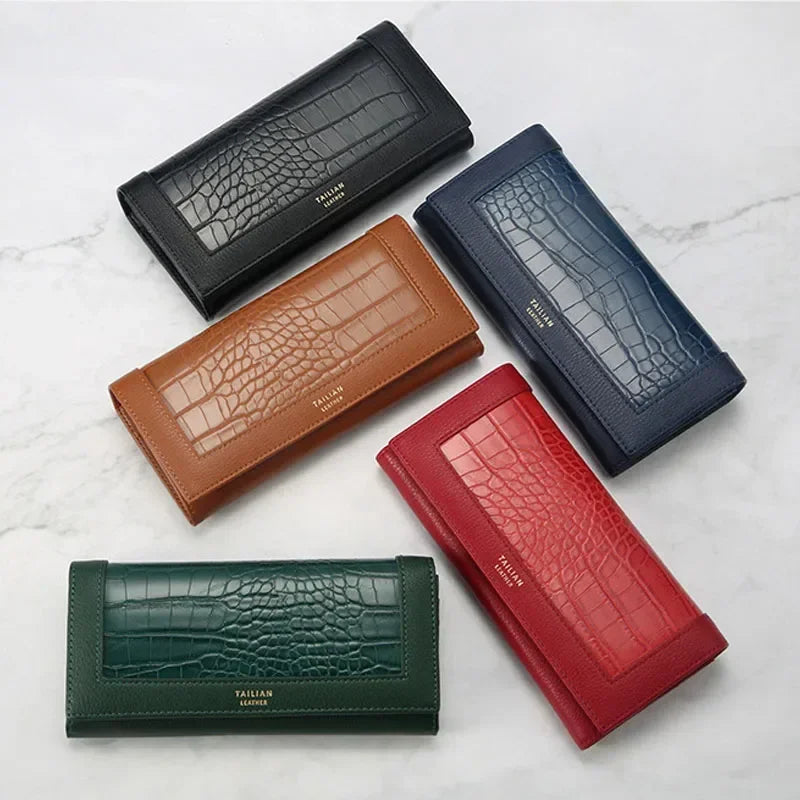 Variety of VaultHaus designer long wallets for women in different colors and crocodile texture