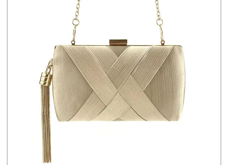 Elegant gold tassel evening clutch purse with an intricate woven design and chain strap
