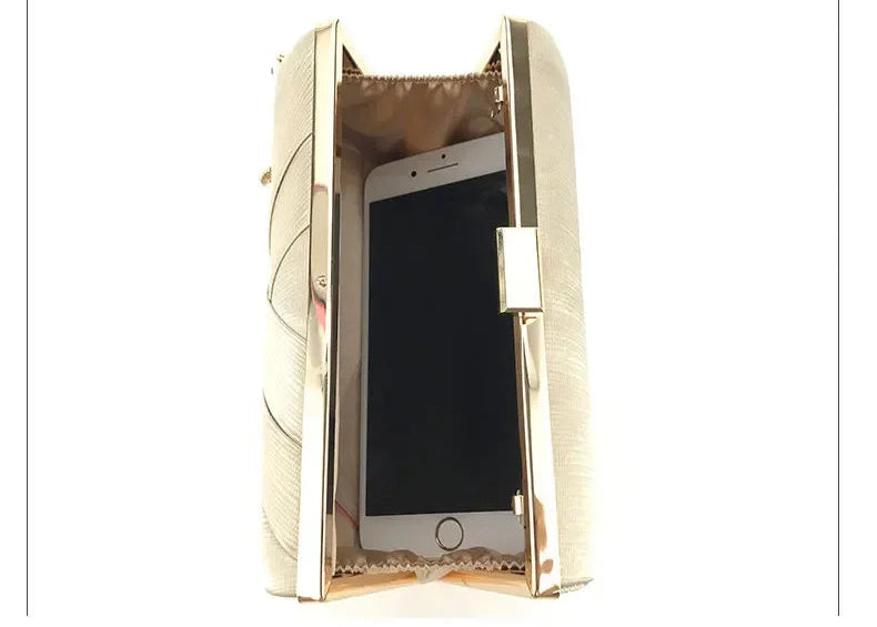 VaultHaus Tassel evening clutch purse opened to show interior space for smartphone and essentials