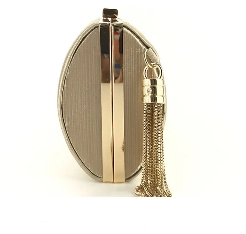 VaultHaus elegant tassel evening clutch purse with metallic finish and decorative tassel charm