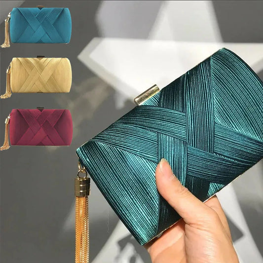 Stylish VaultHaus tassel evening clutch purse in teal, featuring a woven design and gold tassel detail