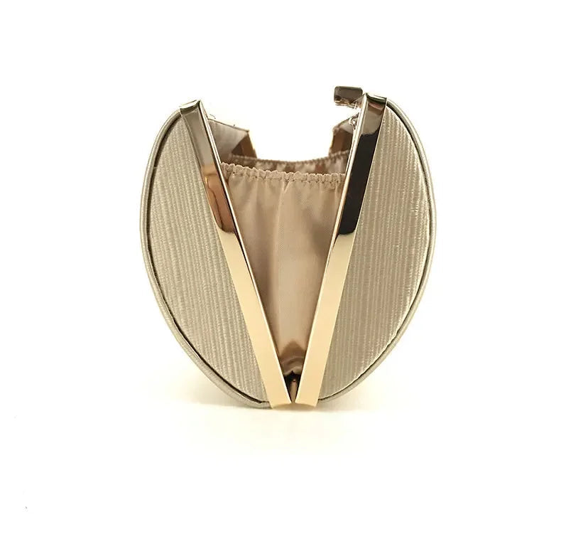 Elegant VaultHaus tassel evening clutch purse with a sleek design and metallic accents