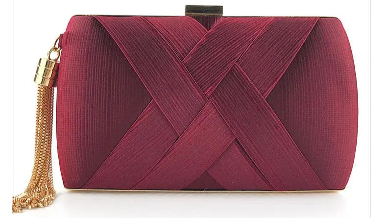 Elegant burgundy tassel evening clutch purse with a unique crisscross design and gold chain detail