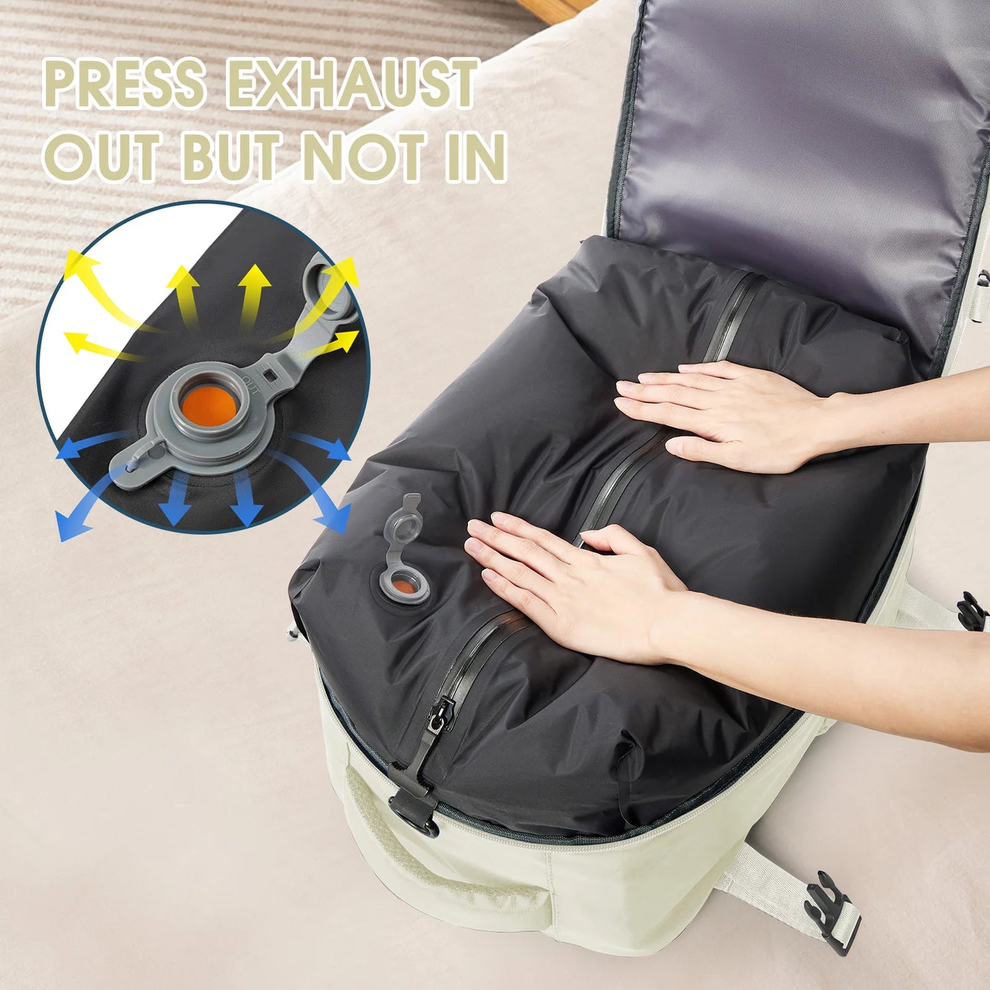 VaultHaus vacuum carry on travel backpack 40x20x25 being compressed with hands to press exhaust valve