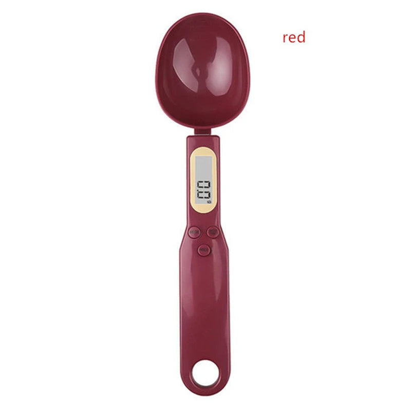 Red mini electronic spoon scale with LCD display for accurate food measuring in the kitchen