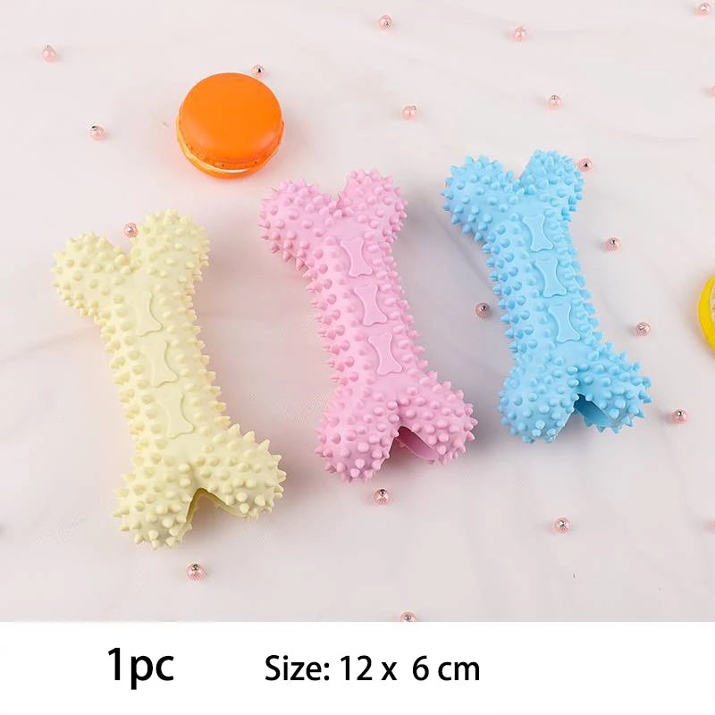 Assorted small dog chew toys in pastel colors, ideal for playful pups and dental health