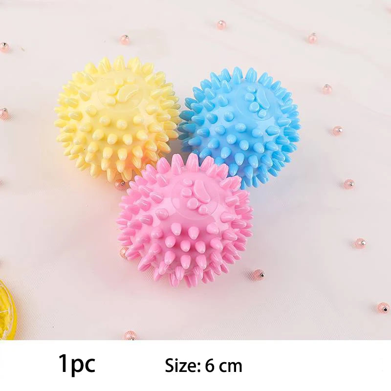 Colorful spiky small dog chew toys in yellow, blue, and pink for playful pups
