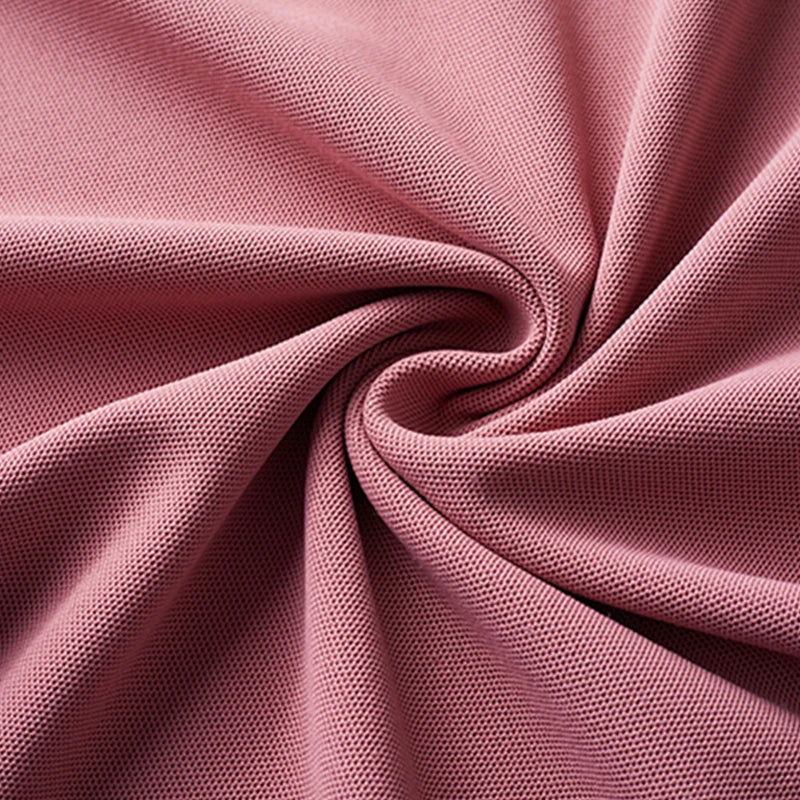 Stylish men's embroidered polo in soft fabric showcasing rich pink texture for modern fashion