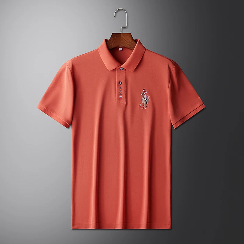 Stylish men's embroidered polo in coral with subtle logo detail and classic collar design