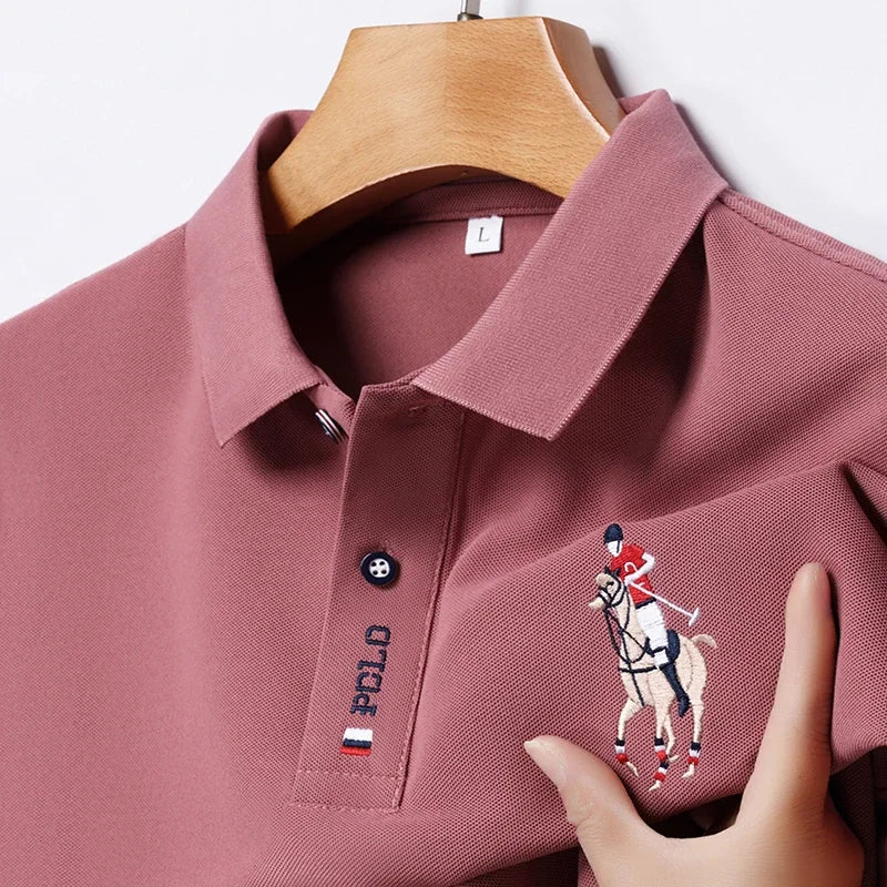 Stylish men's embroidered polo in pink with unique horse logo detail on the chest