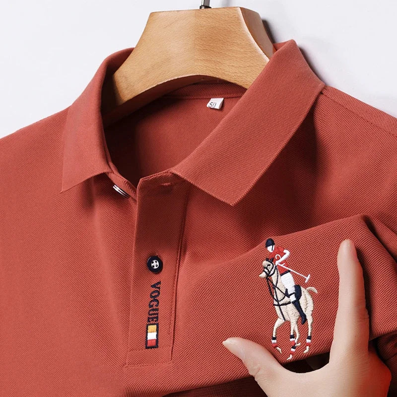 Stylish men's embroidered polo in rust color with a horse design on the chest pocket