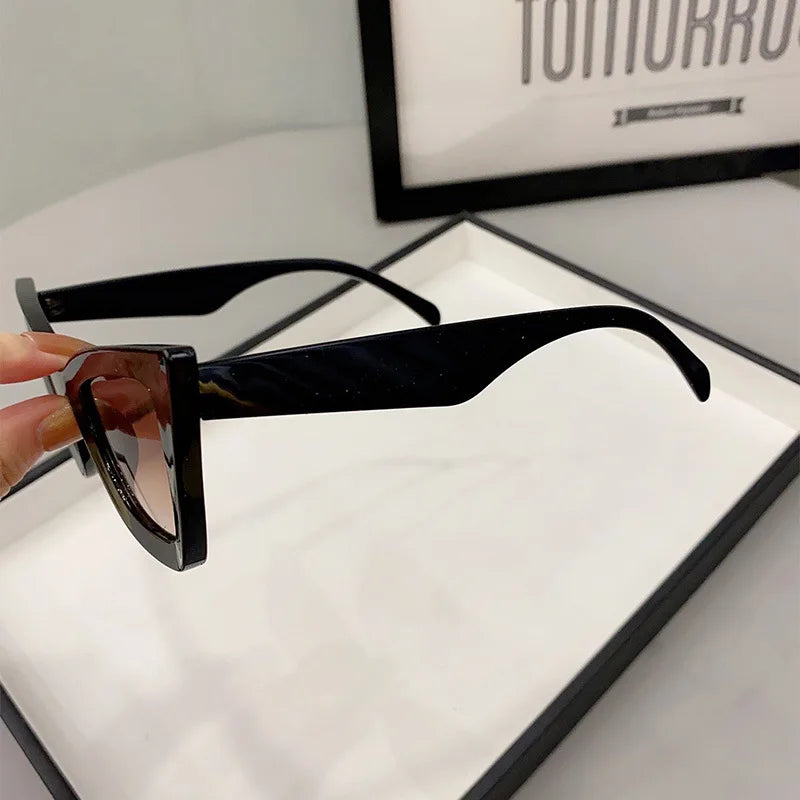 VaultHaus black vintage cat eye sunglasses for women with sleek frame and tinted lenses