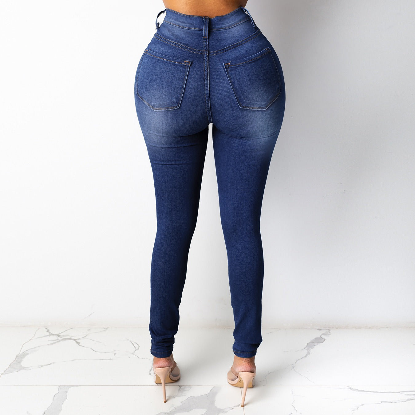 Stylish denim pencil pants for women with a high waist and sleek fit, perfect for a trendy look