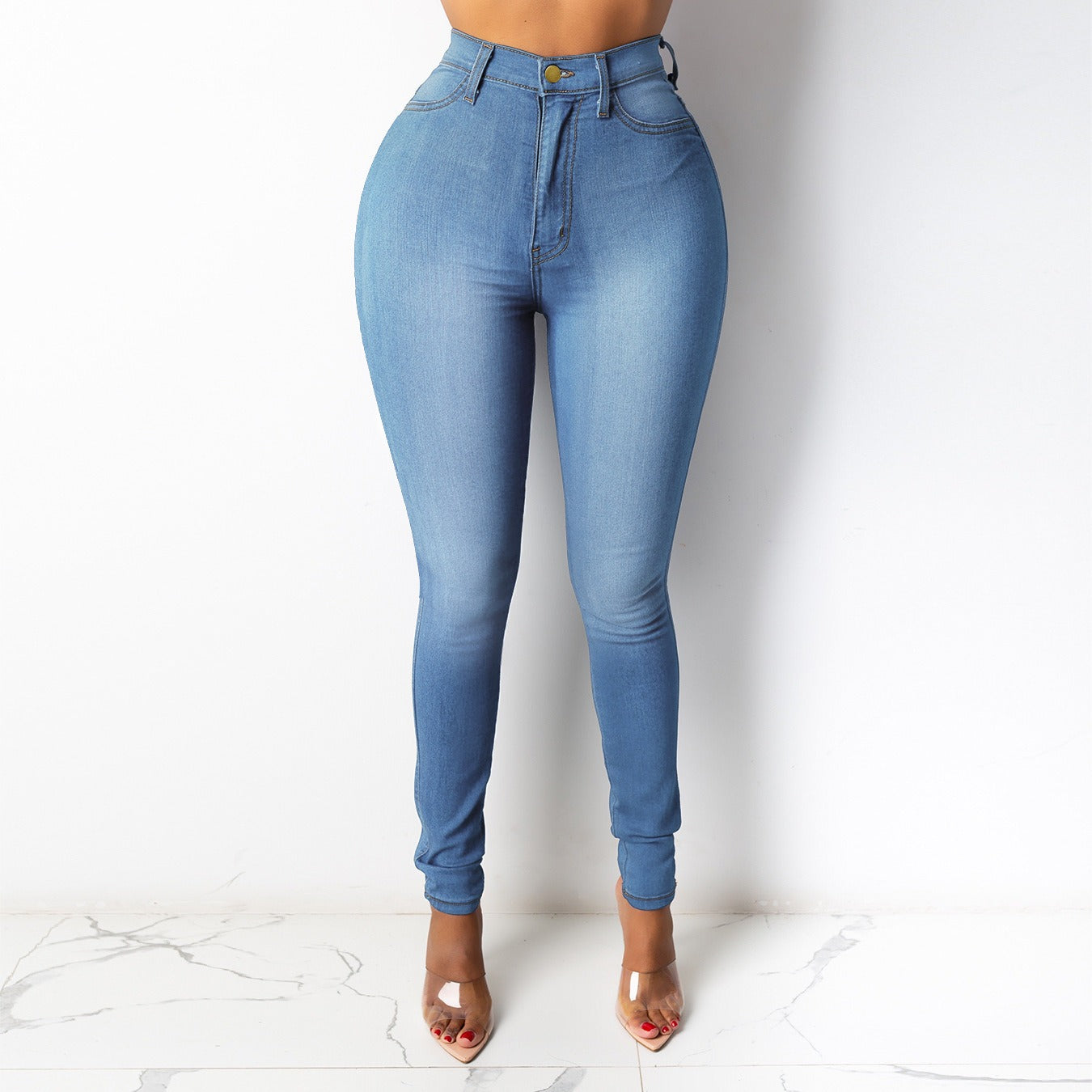 Light blue high-waisted denim pencil pants for women with a sleek fit and stylish design