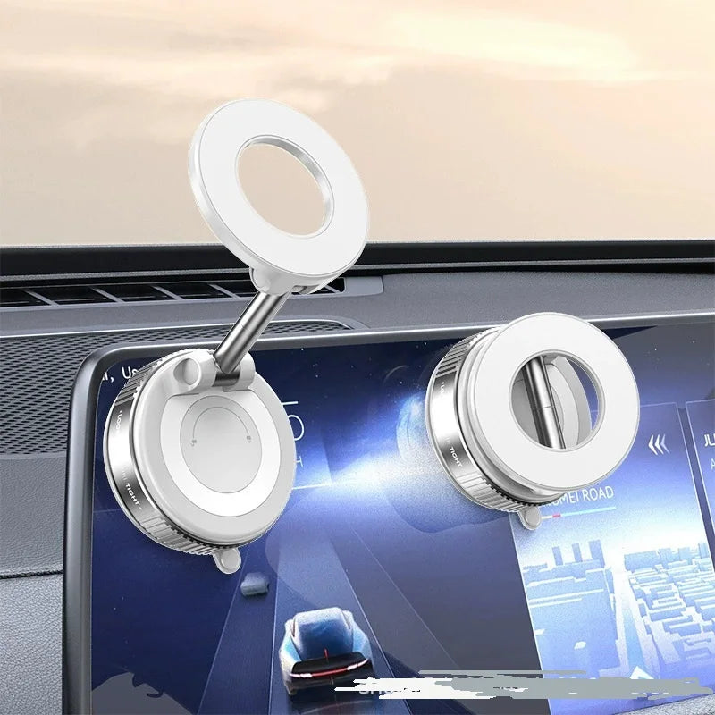 VaultHaus 360 degree magnetic car phone holder in silver mounted on car dashboard touchscreen