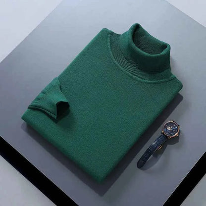 Men's cashmere cotton turtleneck jumper in green, displayed with a wristwatch on a table