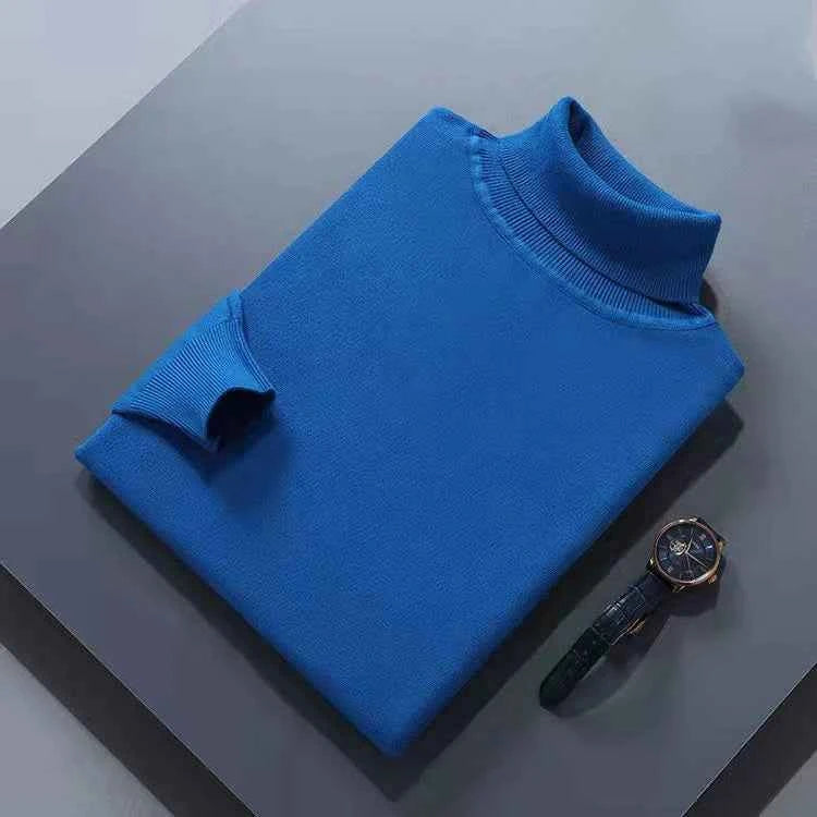 VaultHaus men's cashmere cotton turtleneck jumper in vibrant blue, folded neatly with a stylish watch nearby