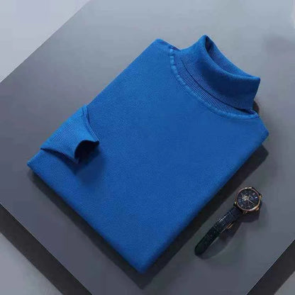 VaultHaus men's cashmere cotton turtleneck jumper in vibrant blue, folded neatly with a stylish watch nearby