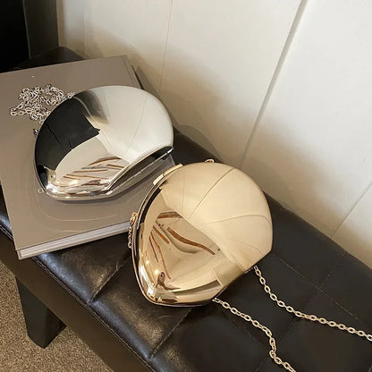 Elegant Acrylic Shell Shape Clutch Bag in Black and Gold with a Chic Design for Special Occasions