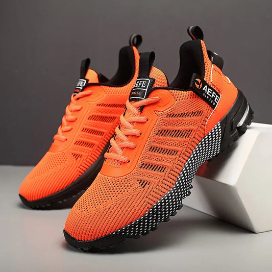 VaultHaus lightweight athletic sneakers for men in vibrant orange with black patterned soles