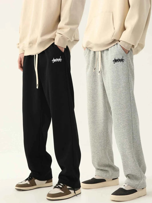 VaultHaus men's loose fit joggers available in black and grey with a casual design