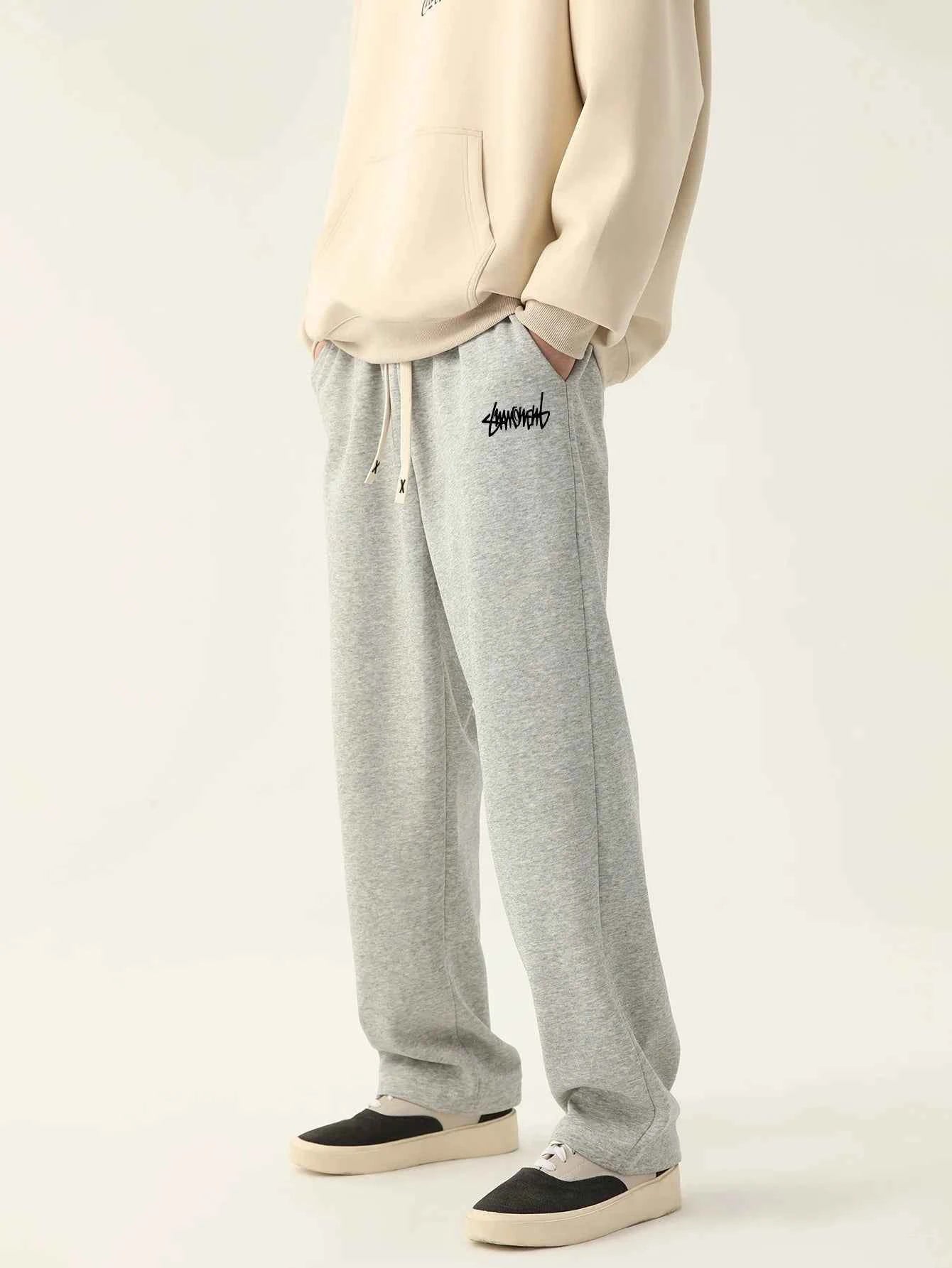 VaultHaus men's loose fit joggers in grey with an elastic waistband and side pockets