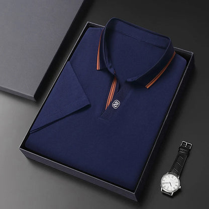 Navy VaultHaus business casual polo top neatly packaged in a box with a stylish watch