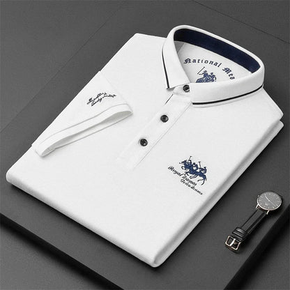 Stylish folded white shirt featuring logo, ideal as a comfortable men's polo top for casual wear
