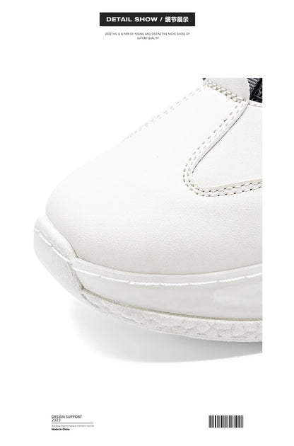 Close-up of VaultHaus comfortable non slip lace up men's sneakers in white showing detailed stitching
