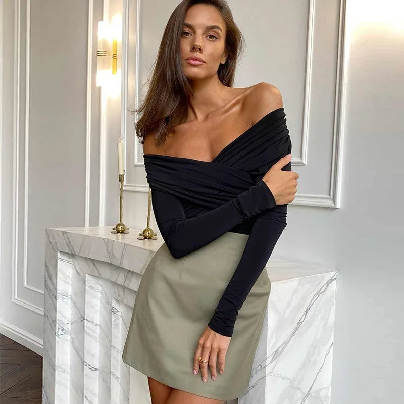 Stylish model wearing a sexy off shoulder bodysuit paired with a chic skirt for a trendy look