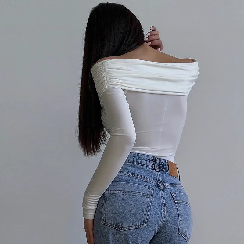 Stylish sexy off shoulder bodysuit in white, perfect for a trendy casual look