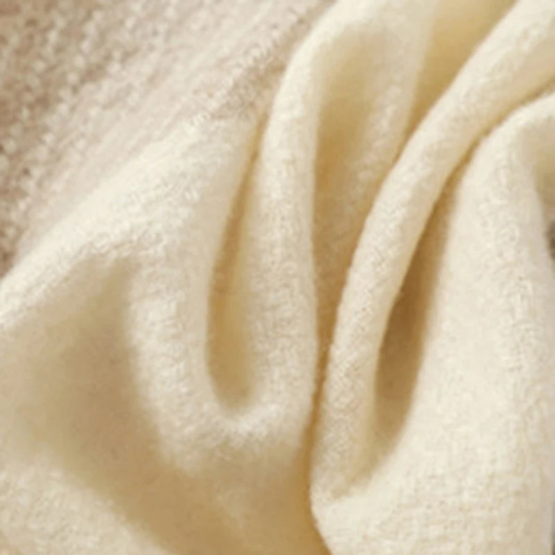 Soft cream cosy faux fur scarf for cold weather with a plush texture and warmth