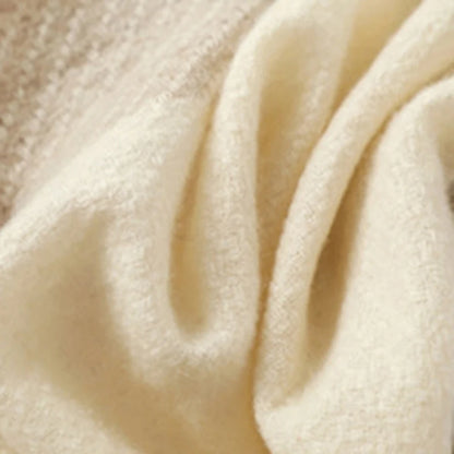 Soft cream cosy faux fur scarf for cold weather with a plush texture and warmth