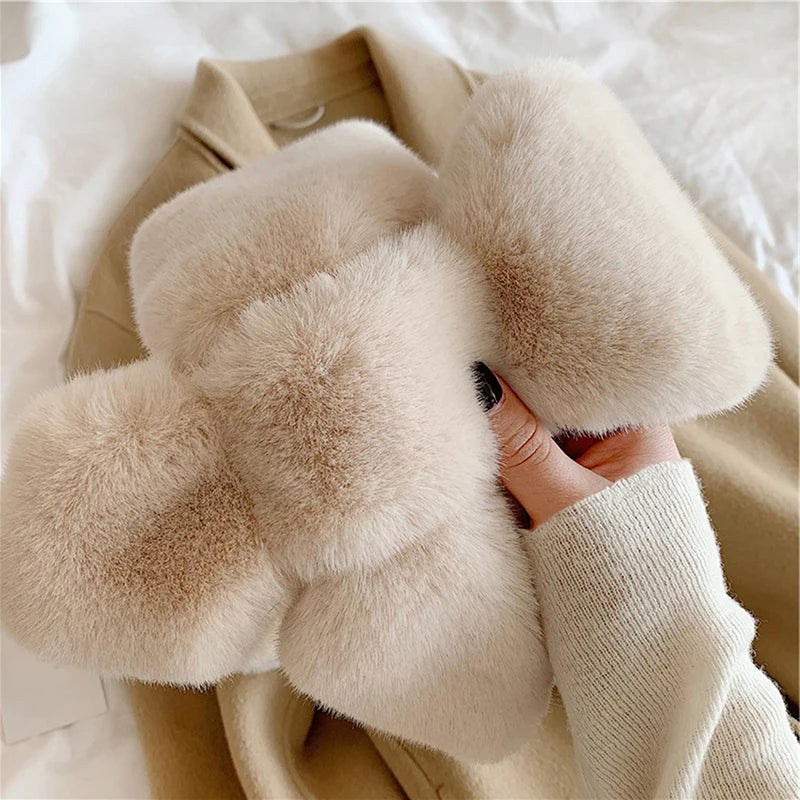 VaultHaus cosy faux fur scarf for cold weather held in hand, showcasing its soft texture and warm design