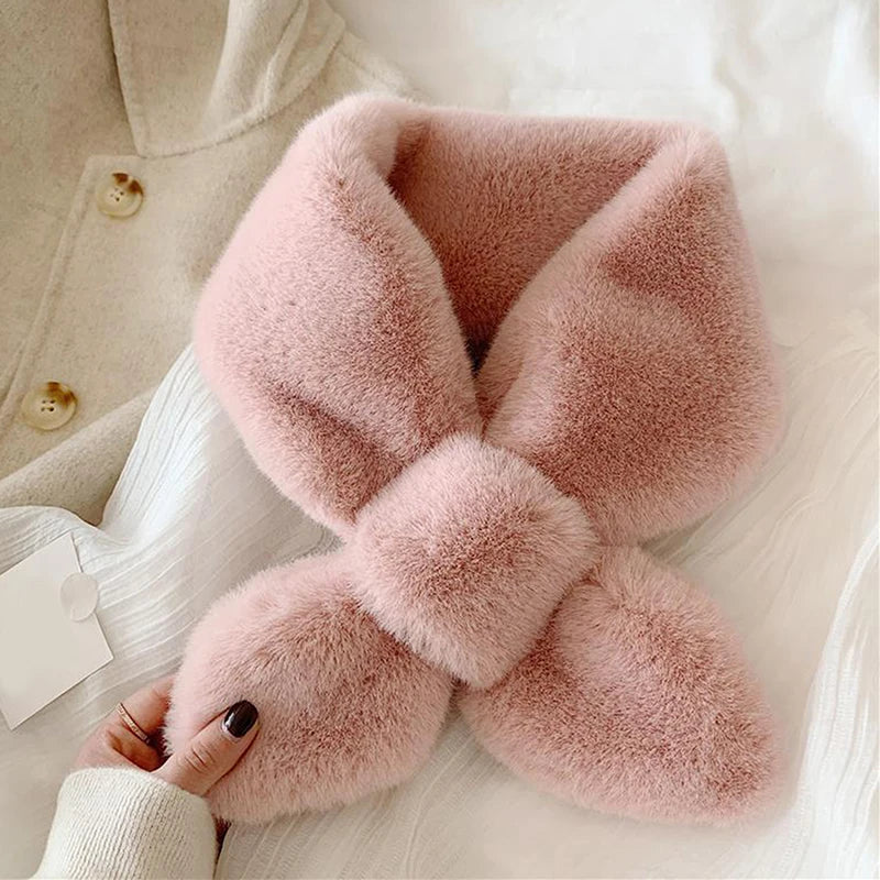 Pretty pink cosy faux fur scarf for cold weather, designed for warmth and style.