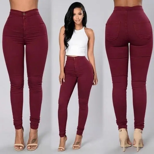 Burgundy curve-friendly skinny jeans featuring high waist and stretchy fabric for a flattering fit