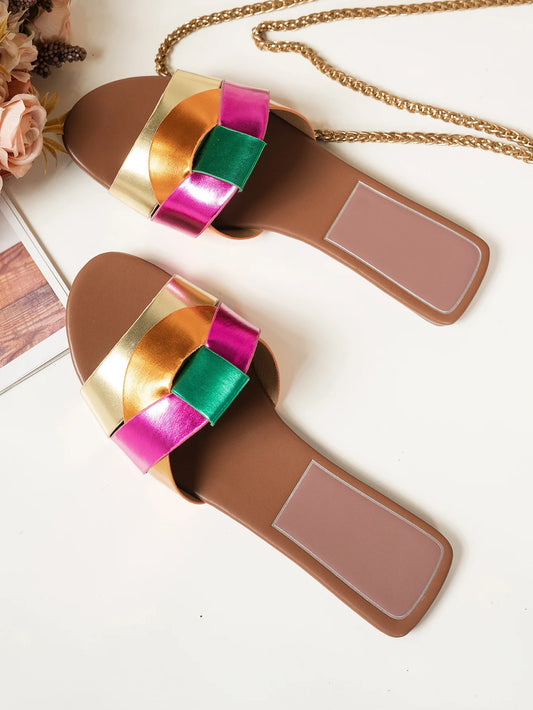 Stylish flat designer sandals 2025 with colorful ribbon detailing and comfortable soles