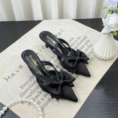 Elegant black shoes with bow, perfect for casual wear or special occasions, French style pink slippers available.
