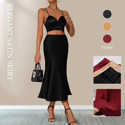 Stylish model wearing a Women's satin elegant midi skirt paired with a chic top and handbag