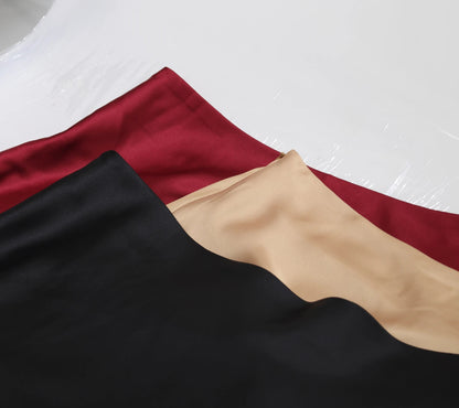 Collection of Women's satin elegant midi skirt in black, burgundy, and beige colors arranged neatly