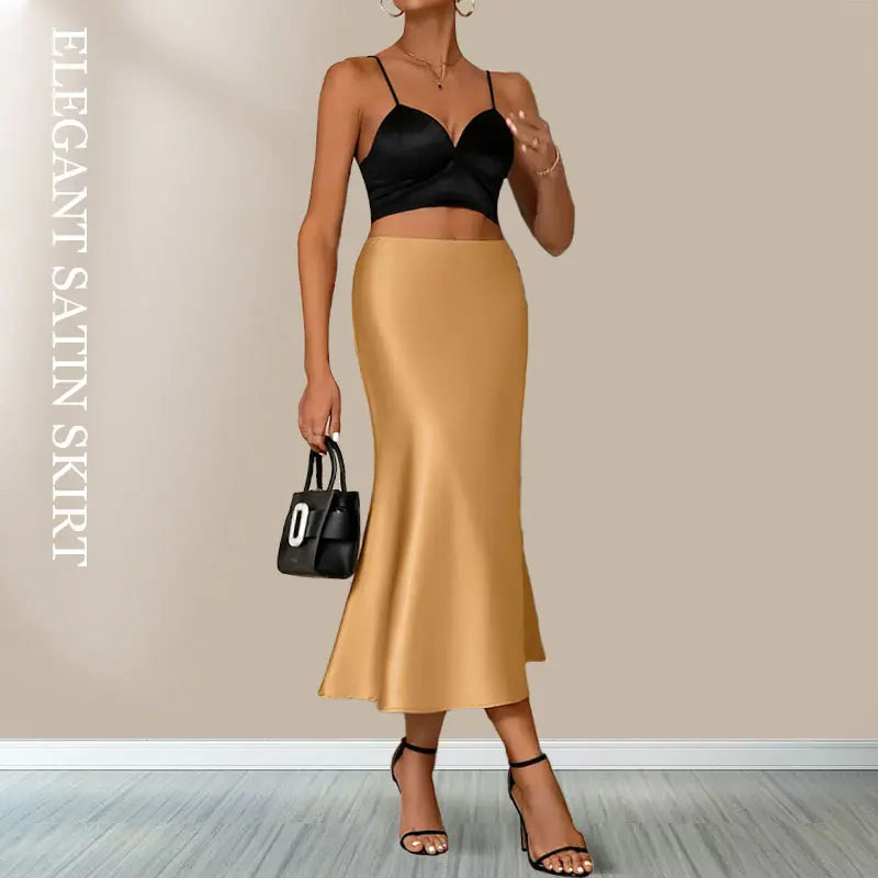 Stylish woman in a black top and gold Women's satin elegant midi skirt for chic occasions
