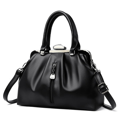 Stylish black high quality PU leather handbag with zip closure and adjustable strap
