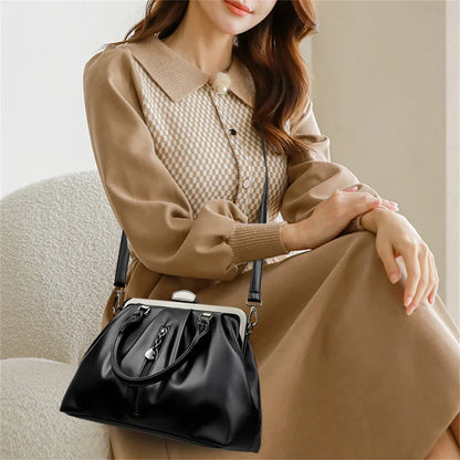 Elegant black handbag made of high quality PU leather, perfect for stylish outfits and daily use