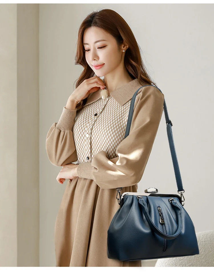 Stylish woman holding a high quality PU leather handbag in navy, perfect for everyday use.