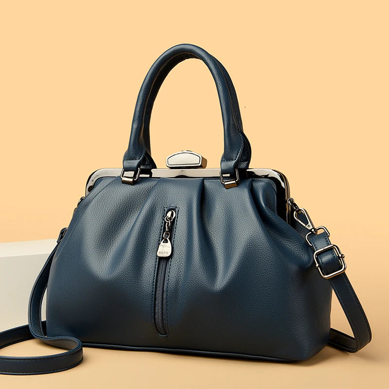 Stylish VaultHaus high quality PU leather handbag in navy with a zippered pocket and adjustable strap
