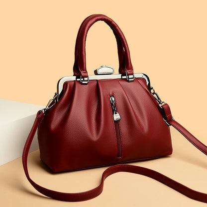 Red high quality PU leather handbag with a stylish design and adjustable shoulder strap