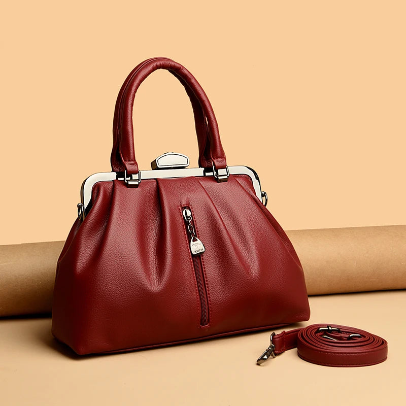 Stylish red high quality PU leather handbag with a secure zip pocket and detachable shoulder strap