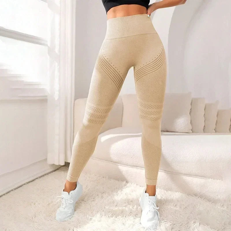 VaultHaus high waist gym tights in beige with a flattering fit and textured design for workout comfort