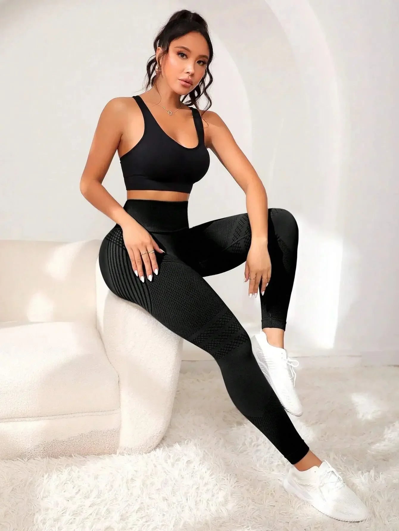 VaultHaus high waist gym tights in black, featuring a stylish design and comfortable fit for workouts